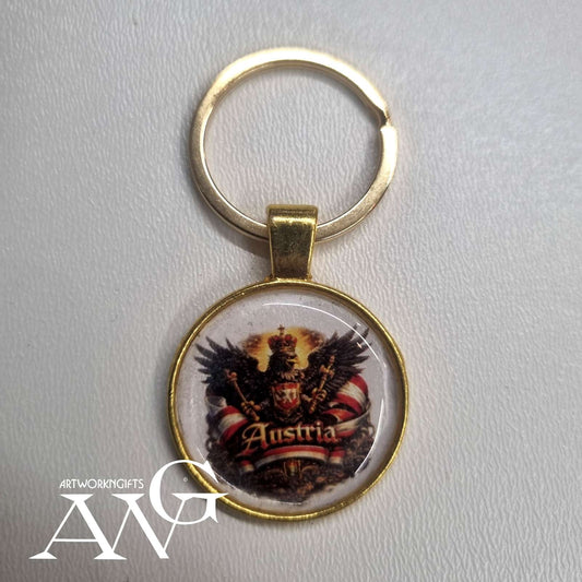 Austrian eagle emblem and the word "Austria". Handmade necklace keychain 25 mm gold