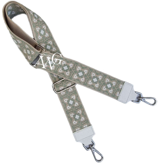 Handbag shoulder strap white. beige. with green pattern